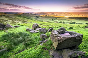 View over Stanage Edge millstones at sunrise, Peak District National Park, Derbyshire View over Stanage Edge millstones at sunrise, Peak District National Park, Derbyshire