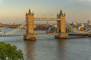 View of Tower Bridge and River Thames from Cheval Three Quays at sunset, London, England View of Tower Bridge and River Thames from Cheval Three Quays at sunset, London, England