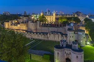 View of the Tower of London, UNESCO World Heritage Site, from Cheval Three Quays at dusk View of the Tower of London, UNESCO World Heritage Site, from Cheval Three Quays at dusk
