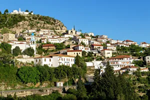 Mountainous European Villages Prints: View of whitewashed buildings on mountainside, village of Dhermi, Albania, Europe