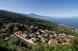 The village of Sauzal with the volcano of El Teide in the distance, Tenerife The village of Sauzal with the volcano of El Teide in the distance, Tenerife