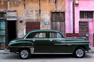 Vintage American car parked on a street in Havana Centro, Havana, Cuba, West Indies, Caribbean, Central America Vintage American car parked on a street in Havana Centro, Havana, Cuba, West Indies, Caribbean, Central America