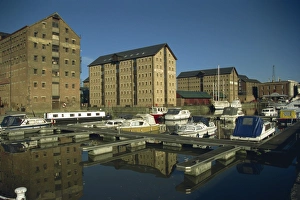 Warehouses and boats in marina at docks, Gloucester, Gloucestershire, England Warehouses and boats in marina at docks, Gloucester, Gloucestershire, England
