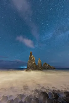Waves crashing over Ilheus da Rib and Ribeira da Janela rock formations under the starry Waves crashing over Ilheus da Rib and Ribeira da Janela rock formations under the starry