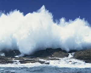 Waves crashing on rocks on the coast of South Africa Waves crashing on rocks on the coast of South Africa