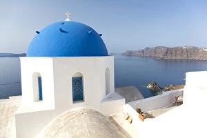 Images Dated 15th June 2015: White church with blue dome overlooking the Caldera, Oia, Santorini, Cyclades, Greek Islands