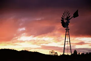 Windmill (wind pump) at sunset, South Australia, Australia, Pacific Windmill (wind pump) at sunset, South Australia, Australia, Pacific
