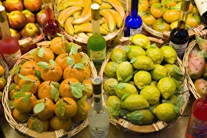 Window display of traditional marzipan fruits and grappa Window display of traditional marzipan fruits and grappa