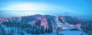 Finland Collection: Winter dusk over the snowy ski slopes of Ruka tourist resort, aerial view, Kuusamo