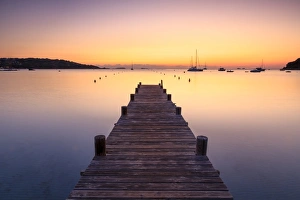 Wooden jetty at dawn, sunrise, long exposure, Corsica, France, Mediterranean, Europe Wooden jetty at dawn, sunrise, long exposure, Corsica, France, Mediterranean, Europe