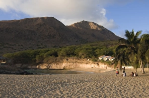 Young men in the afternoon on sandy beach of Tarrafal, Santiago, Cape Verde Islands Young men in the afternoon on sandy beach of Tarrafal, Santiago, Cape Verde Islands