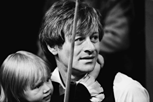 Alex Higgins with his daughter at the 1983 World Snooker Championships Alex Higgins with his daughter at the 1983 World Snooker Championships