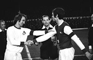 Arsenal captain Frank McLintock shakes hands with Koln captain Wolfgang Overath - 1970/1 Arsenal captain Frank McLintock shakes hands with Koln captain Wolfgang Overath - 1970/1