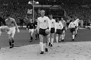 Bobby Moore leads England out against Scotland at Wembley in 1965 Bobby Moore leads England out against Scotland at Wembley in 1965