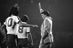 Ipswich Town Collection: Bobby Robson salutes the Portman Road crowd at the final whistle of his testimonial game in 1979