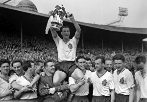 Bolton Wanderers captain Nat Lofthouse is chaired by his teammates after victory in Bolton Wanderers captain Nat Lofthouse is chaired by his teammates after victory in