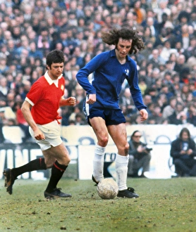 Chelseas Mike Brolly and Manchester Uniteds Willie Morgan Chelseas Mike Brolly and Manchester Uniteds Willie Morgan