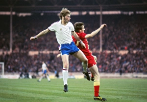 Englands Brian Greenhoff and Wales Joey Jones - 1977 British Home Championship Englands Brian Greenhoff and Wales Joey Jones - 1977 British Home Championship