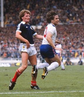 Englands Kenny Sansom and Scotlands Davie Provan Englands Kenny Sansom and Scotlands Davie Provan