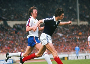 Englands Mick Channon and Scotlands Tom Forsyth - 1977 British Home Championship Englands Mick Channon and Scotlands Tom Forsyth - 1977 British Home Championship