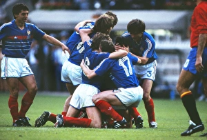 France captain Michel Platini is mobbed by team mates after scoring his sides opening goal in the Euro 84 final France captain Michel Platini is mobbed by team mates after scoring his sides opening goal in the Euro 84 final