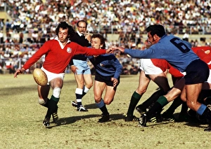 Gareth Edwards clears the ball for the British Lions in 1974 Gareth Edwards clears the ball for the British Lions in 1974