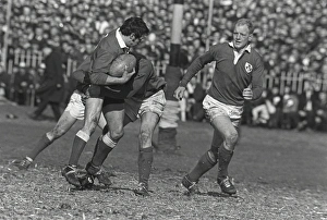 Gareth Edwards under pressure from Michael Hipwell and Ken Kennedy - 1969 Five Nations Gareth Edwards under pressure from Michael Hipwell and Ken Kennedy - 1969 Five Nations