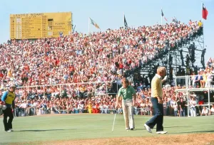 Prints of Golf - The Open Championship Jack Nicklaus acknowledges the crowd after finishing on the final hole. Tom Watson (winner) behind, prepares to putt his winning shot Golf Prints: Jack Nicklaus and Tom Watson Golf Print at the 1977 Open Championship