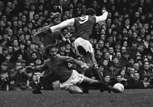 Ipswichs Mick Mills tackles Arsenals John Radford Ipswichs Mick Mills tackles Arsenals John Radford