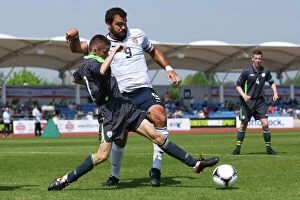 Images Dated 23rd May 2012: Irelands Peter Cotter challenges USAs Josh McKinney at the 2012 Paralympic World Cup