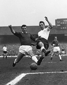 Jimmy Greaves and Noel Cantwell compete for the ball in the 1962 FA Cup semi-final Jimmy Greaves and Noel Cantwell compete for the ball in the 1962 FA Cup semi-final