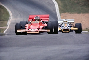 Jochen Rindt and Jack Brabham approach Druids at the 1970 British Grand Prix at Brands Hatch Jochen Rindt and Jack Brabham approach Druids at the 1970 British Grand Prix at Brands Hatch