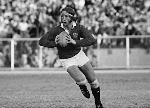 JPR Williams runs with the ball for the British Lions JPR Williams runs with the ball for the British Lions
