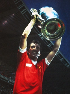 Liverpool goalscorer Alan Kennedy celebrates with the trophy - 1981 European Cup Final Liverpool goalscorer Alan Kennedy celebrates with the trophy - 1981 European Cup Final