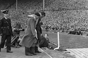Manchester Citys Jimmy Meadows leaves the field with a knee injury in the 1955 FA Cup Final Manchester Citys Jimmy Meadows leaves the field with a knee injury in the 1955 FA Cup Final
