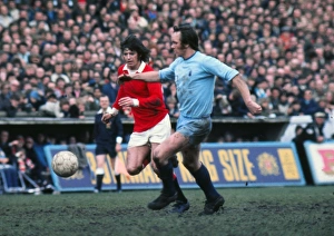 Manchester Uniteds Willie Morgan and Coventrys Roy Barry Manchester Uniteds Willie Morgan and Coventrys Roy Barry