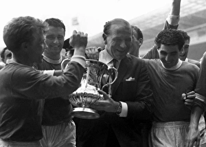 Matt Busby and his Manchester United players with the FA Cup in 1963 Matt Busby and his Manchester United players with the FA Cup in 1963