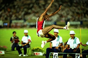 Mike Powell breaks the long jump World Record Mike Powell breaks the long jump World Record