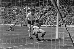 Nat Lofthouse controversially collides with goalkeeper Harry Gregg for his second goal in the 1958 FA Cup Final Nat Lofthouse controversially collides with goalkeeper Harry Gregg for his second goal in the 1958 FA Cup Final