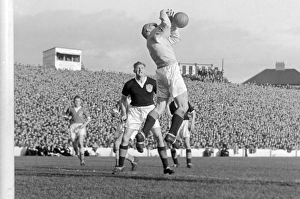 Scotland keeper Tommy Younger catches a high ball with George Young looking on in 1956 Scotland keeper Tommy Younger catches a high ball with George Young looking on in 1956