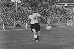 Stanley Matthews crosses the ball for England against Wales in 1956 Stanley Matthews crosses the ball for England against Wales in 1956
