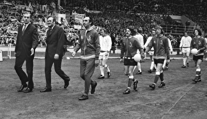 Sunderland manager Bob Stokoe (right) and Leeds United manager Don Revie lead out their Sunderland manager Bob Stokoe (right) and Leeds United manager Don Revie lead out their