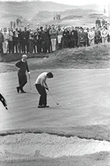 Tony Jacklin putts while Jack Nicklaus looks on during their famous 1969 Ryder Cup singles match Tony Jacklin putts while Jack Nicklaus looks on during their famous 1969 Ryder Cup singles match