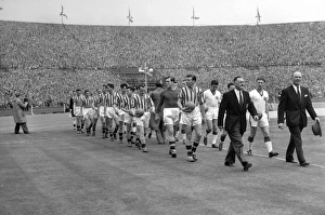 United manager Matt Busby and Villa manager Eric Houghton lead their sides out for the 1957 FA Cup Final United manager Matt Busby and Villa manager Eric Houghton lead their sides out for the 1957 FA Cup Final