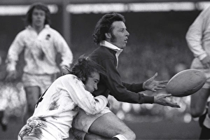 Wales JJ Williams is tackled by Englands Peter Squires - 1974 Five Nations Wales JJ Williams is tackled by Englands Peter Squires - 1974 Five Nations