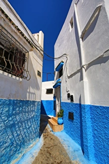 Blue and white walls of buildings in the Kasbah of the Udayas in Rabat, Morocco Blue and white walls of buildings in the Kasbah of the Udayas in Rabat, Morocco
