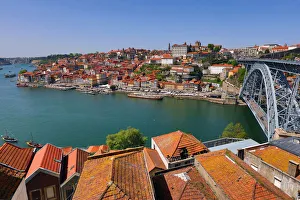 The Dom Luis I metal arch bridge and the city skyline in Porto, Portugal The Dom Luis I metal arch bridge and the city skyline in Porto, Portugal