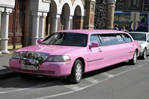 Pink stretch limousine car in St. Petersburg, Russia Pink stretch limousine car in St. Petersburg, Russia