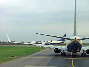 Modern aircraft/boeing 737 800 ryanair queue stansted airport Modern aircraft/boeing 737 800 ryanair queue stansted airport