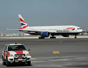 Modern Aircraft Collection: Boeing 777-200 British Airways at Dubai airport with ramp vehicle